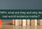 White text on a green banner, reading 'ATMPs: what are they and why does real-world evidence matter?'. Behind the banner are several plain wooden figures on a table, arranged so they are facing a lone wooden figure that has been painted red.